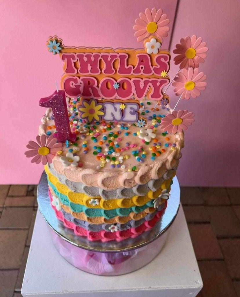 Groovy cake topper